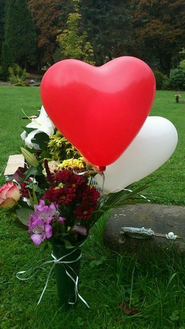 Blumen am Grab